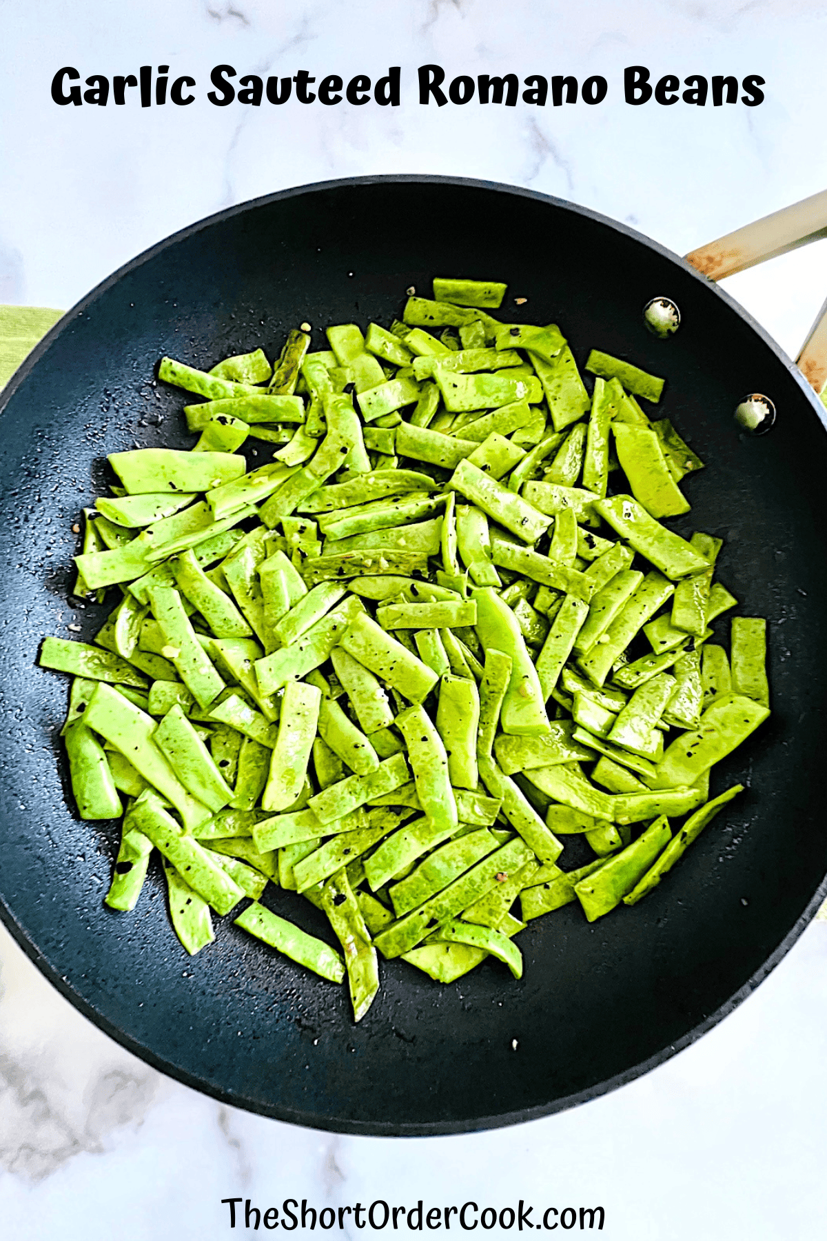 Garlic Sauteed Romano Beans in a skillet.