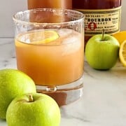 Apple Cider Bourbon Cocktail in whiskey glass.