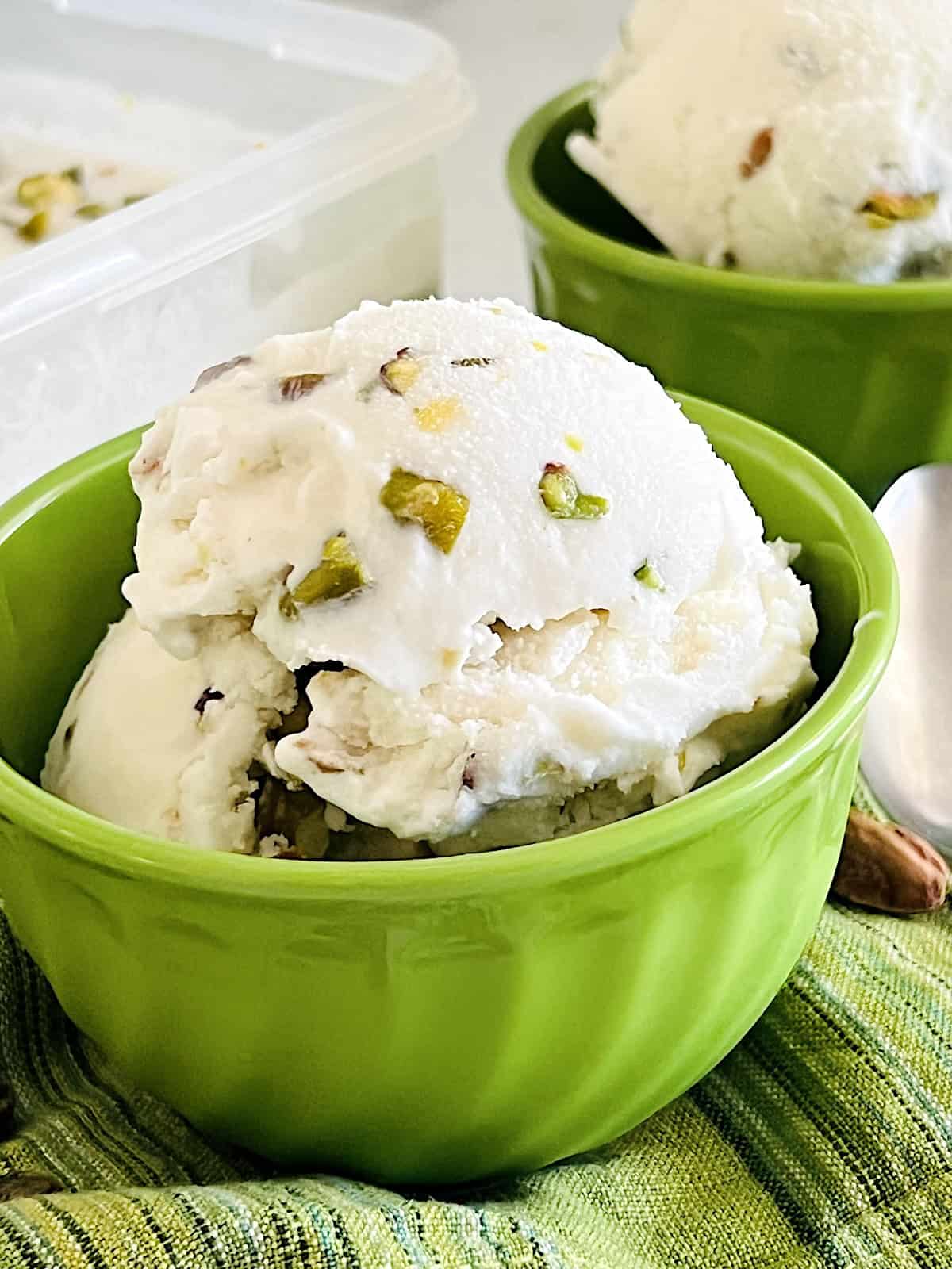 Pistachio Ice Cream Best homemade Recipe loaded with nuts and churned in an ice cream maker.