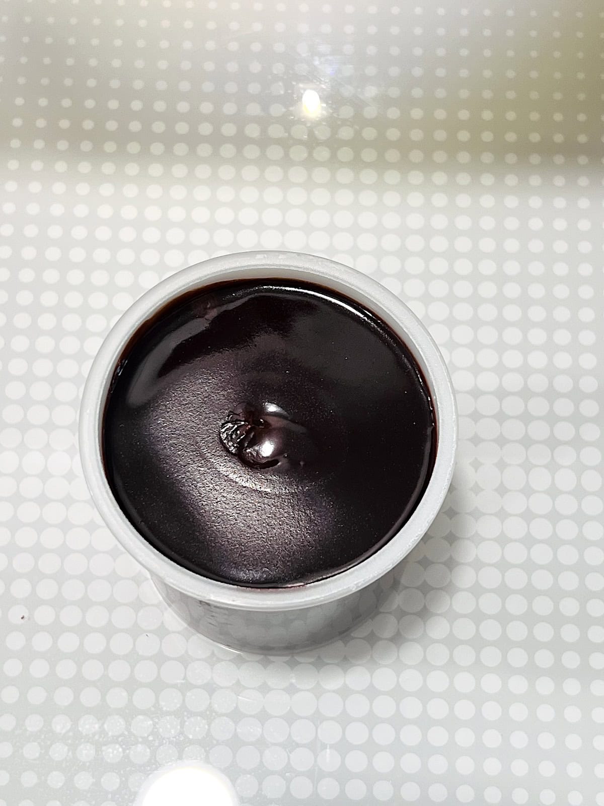 Can of frosting in the microwave.