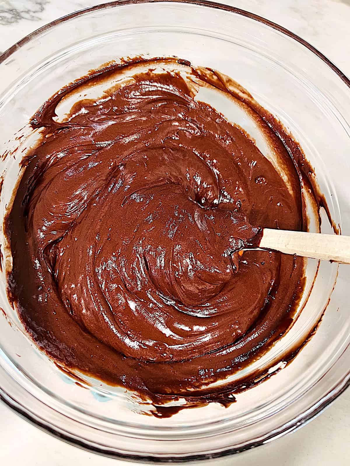 2 Ingredient Frosting Fudge Frosting and melted chocolate stirred together.