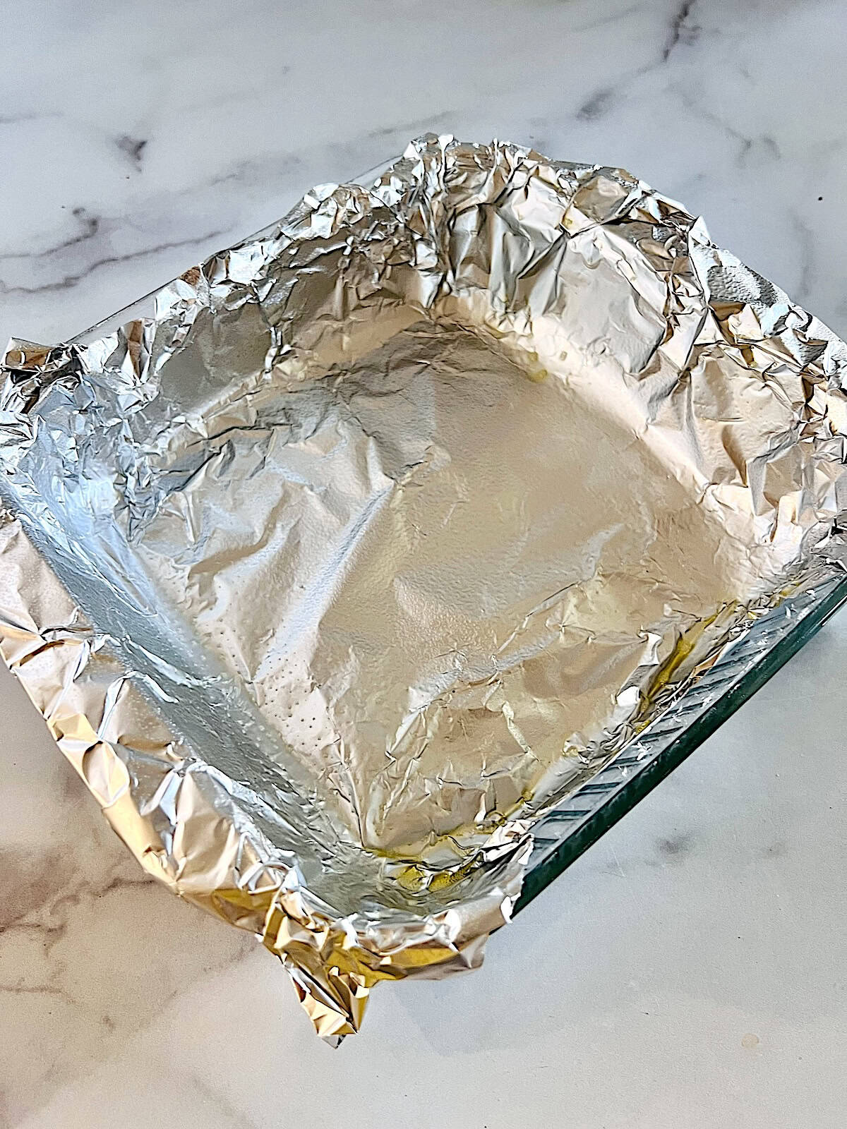 Sprayed foil in a square pan.