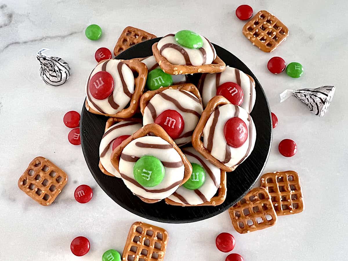 Snap pretzel dessert with holiday red & green M&Ms and Hershey's hug candies.