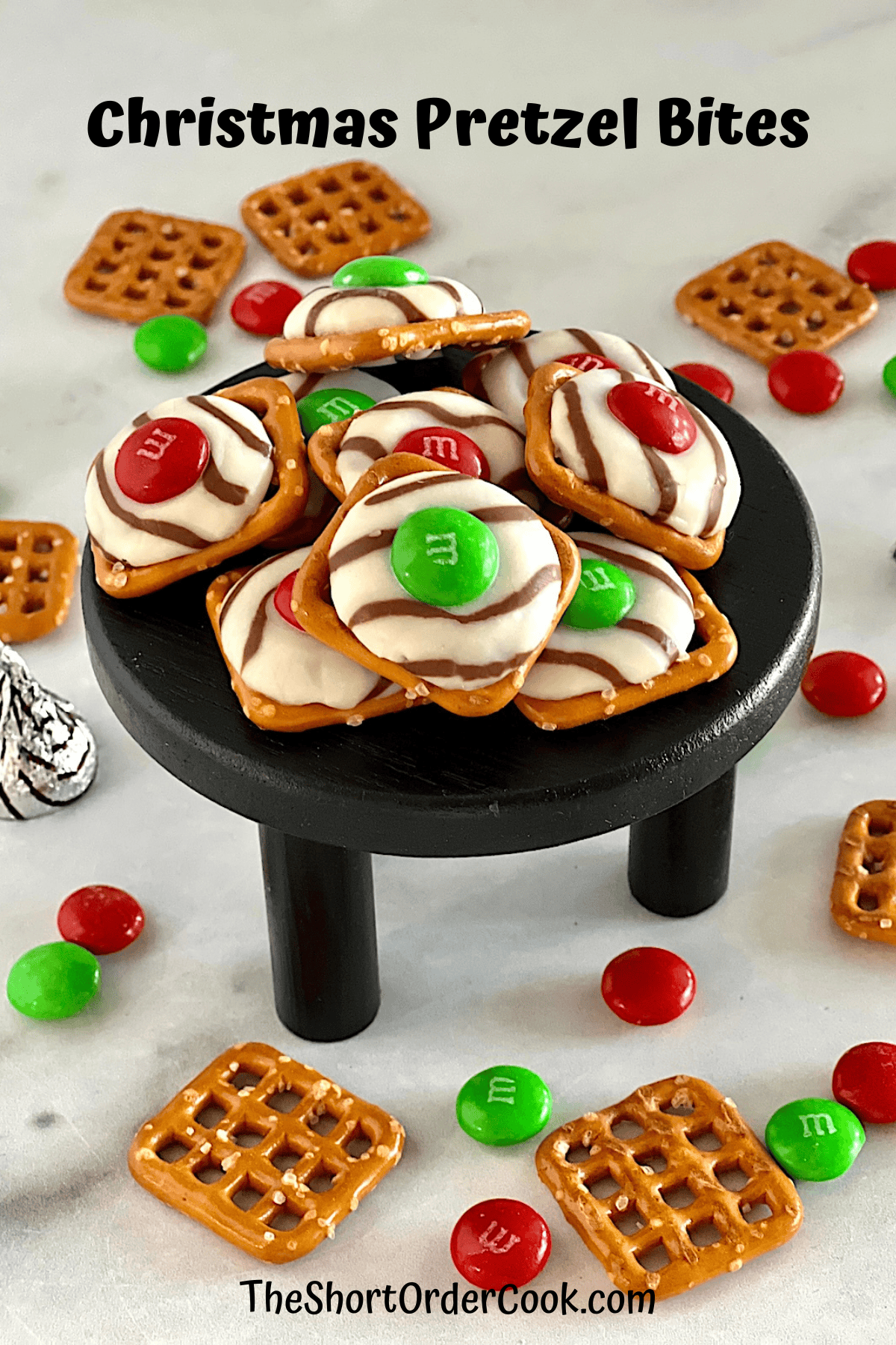 Christmas Pretzel Bites served on an elevated tray.