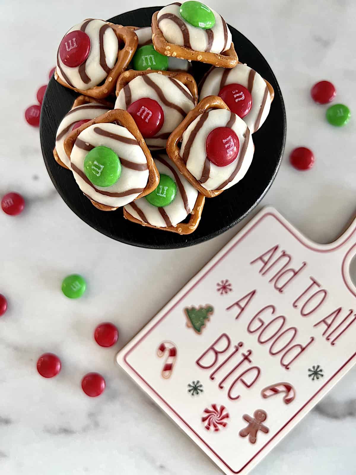 Christmas Pretzel Bites Serving next to Christmas sign.