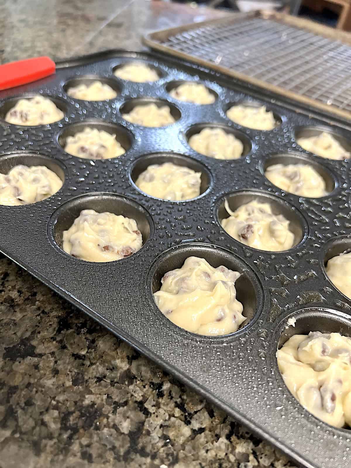 Mini Chocolate Chip Muffins Batter in the pan.