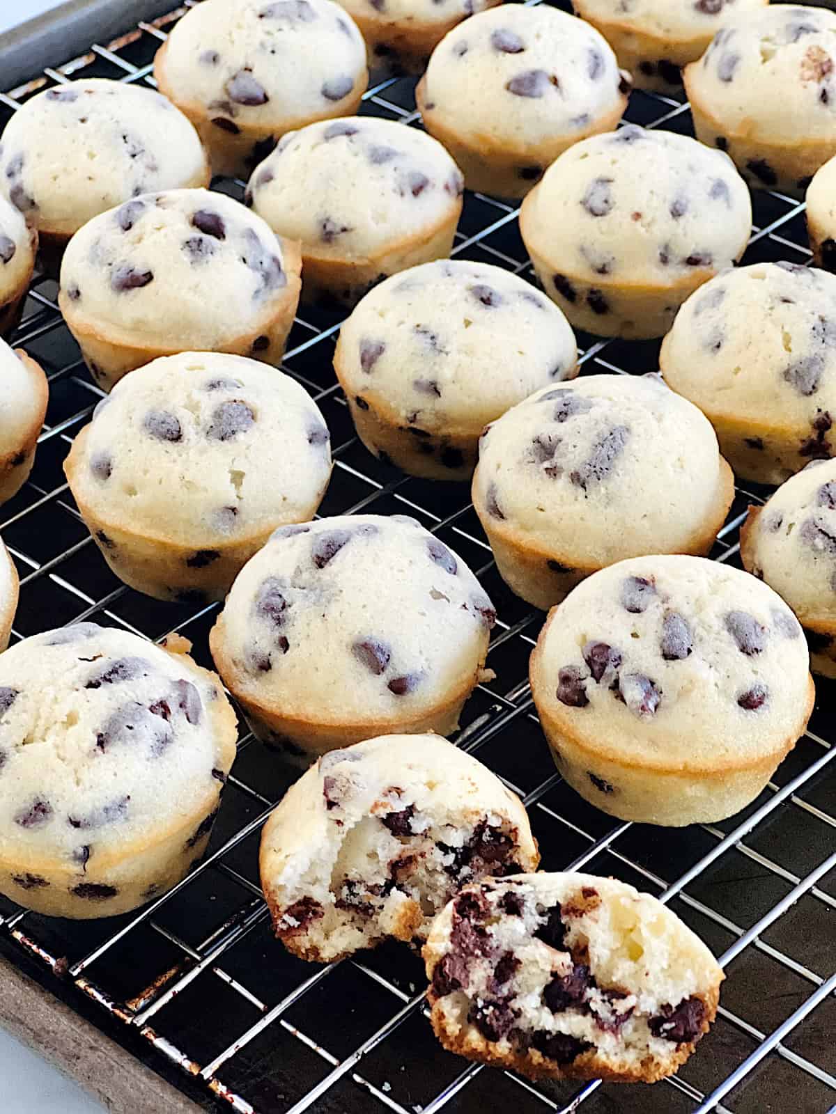 Mini Chocolate Chip Muffins Cooling on the rack.