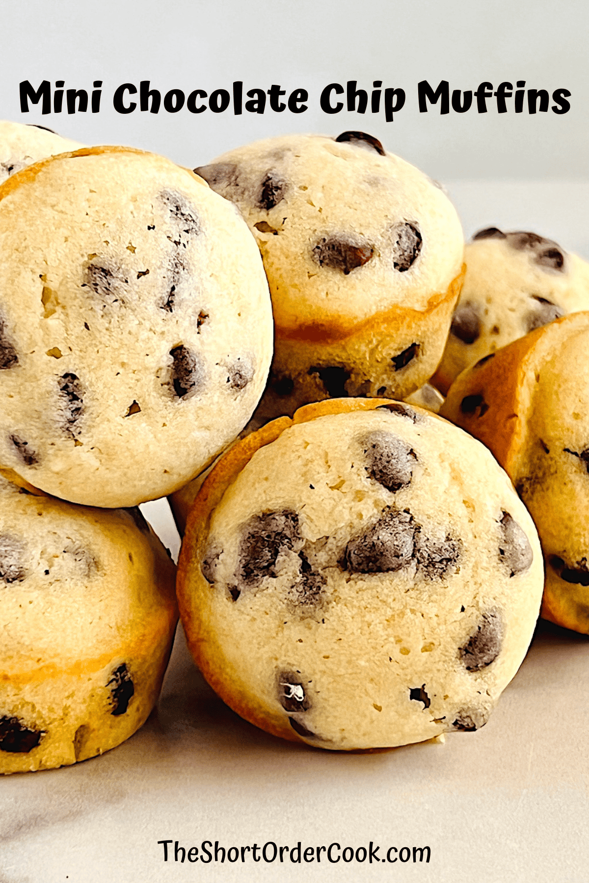 Mini Chocolate Chip Muffins stacked up.