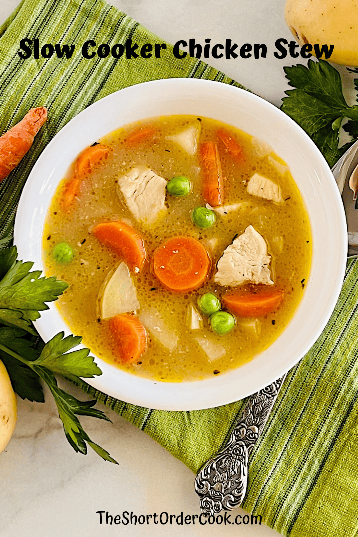 Chicken Stew made in the Crockpot with potatoes peas and carrots.