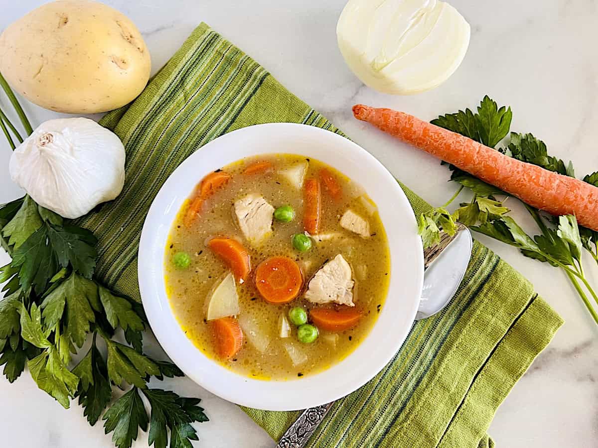 Slow Cooker Chicken Stew in a bowl ready to eat.
