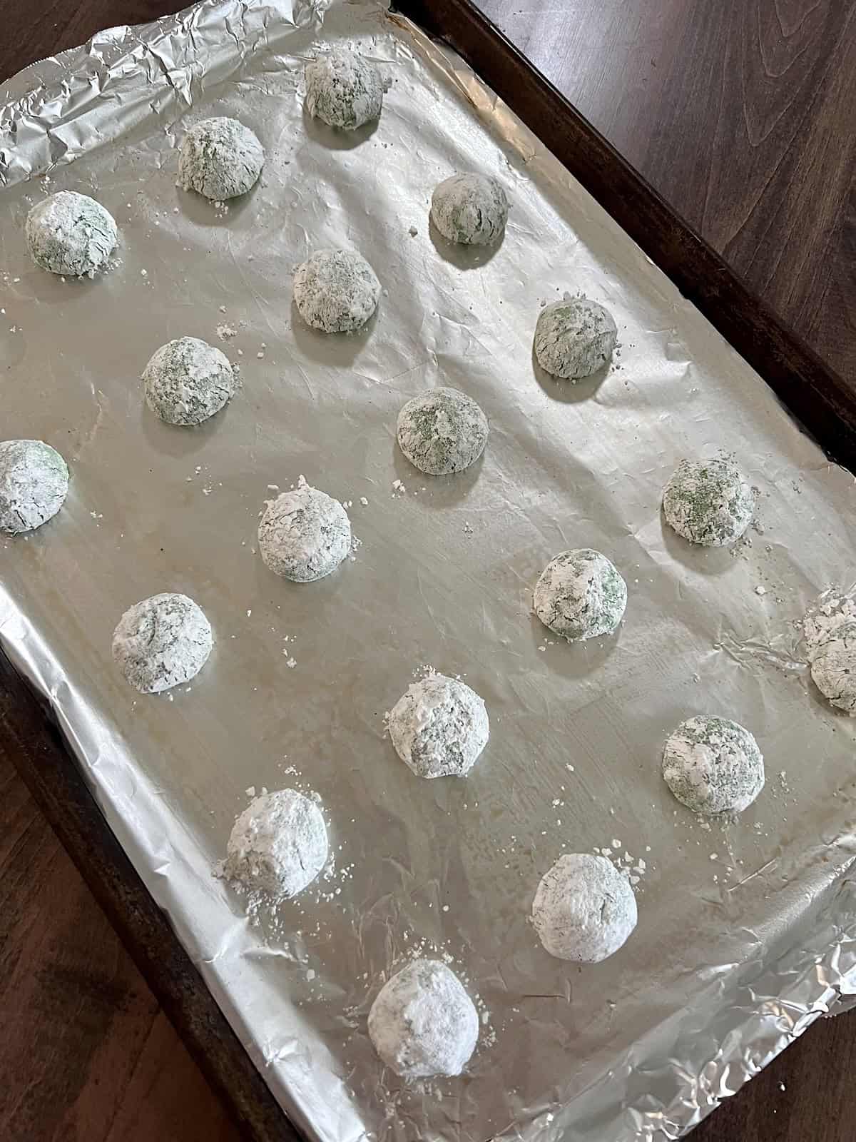 Green Cake Mix Crinkle Cookies 20 balls of sugar coated dough ready to bake.