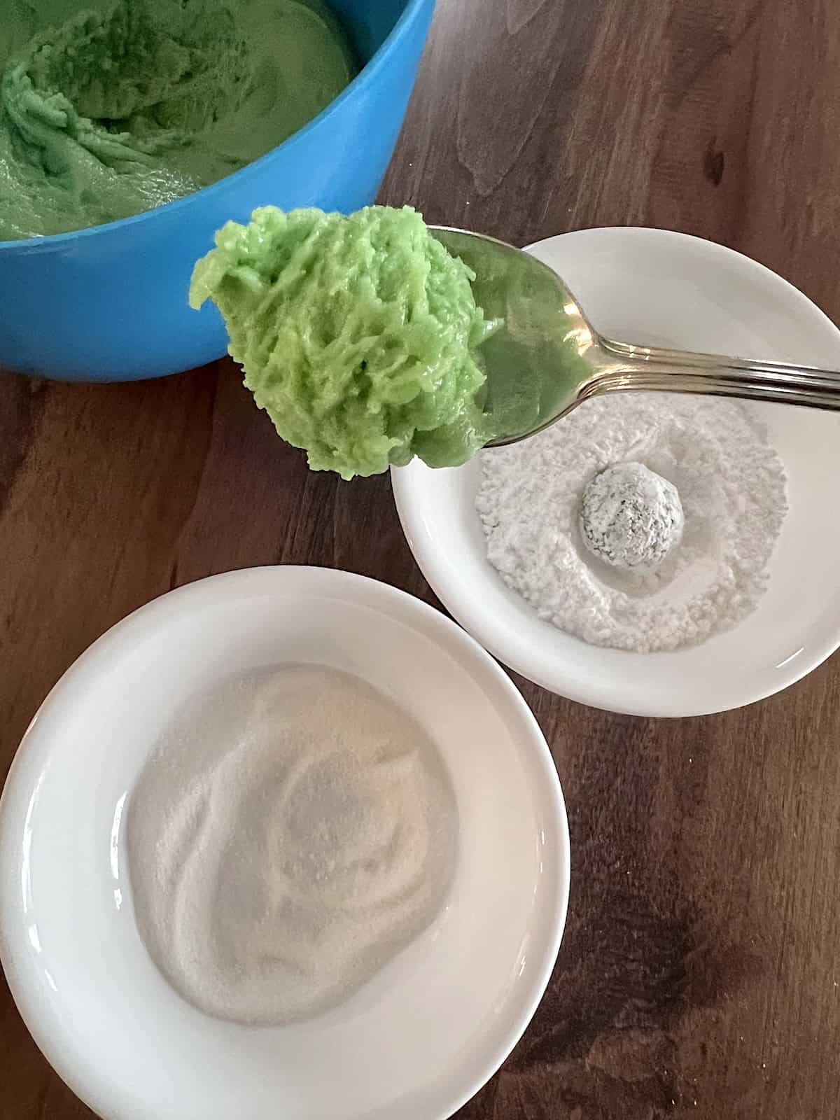 Rolling balls in two different sugars.