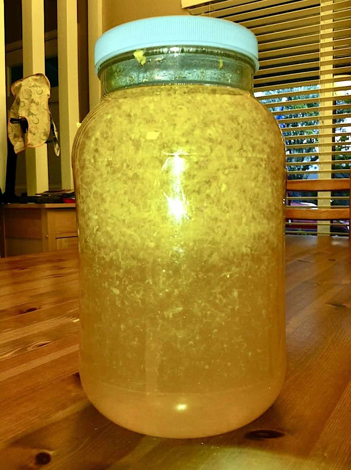 Homemade Limoncello in a jug.