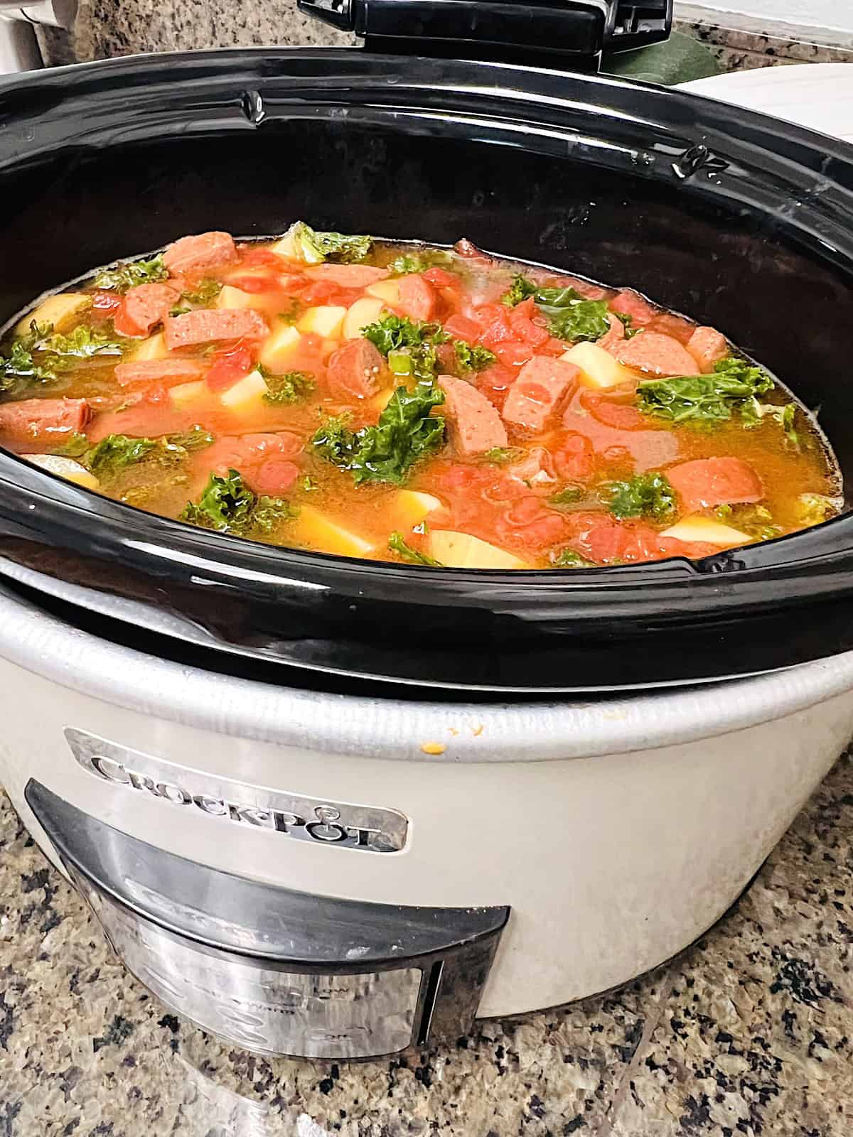 Slow Cooker Sausage Kale Soup with potatoes done in CrockPot.