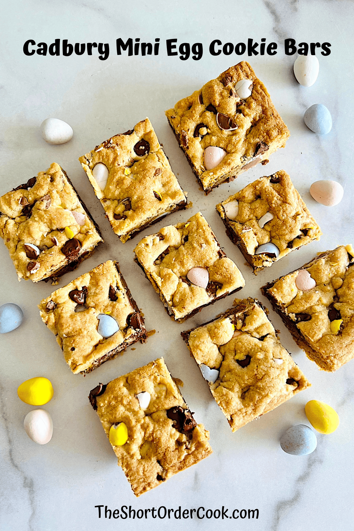 Cadbury Mini Egg Cookie Bars cut into squares and ready to eat for Easter dessert.