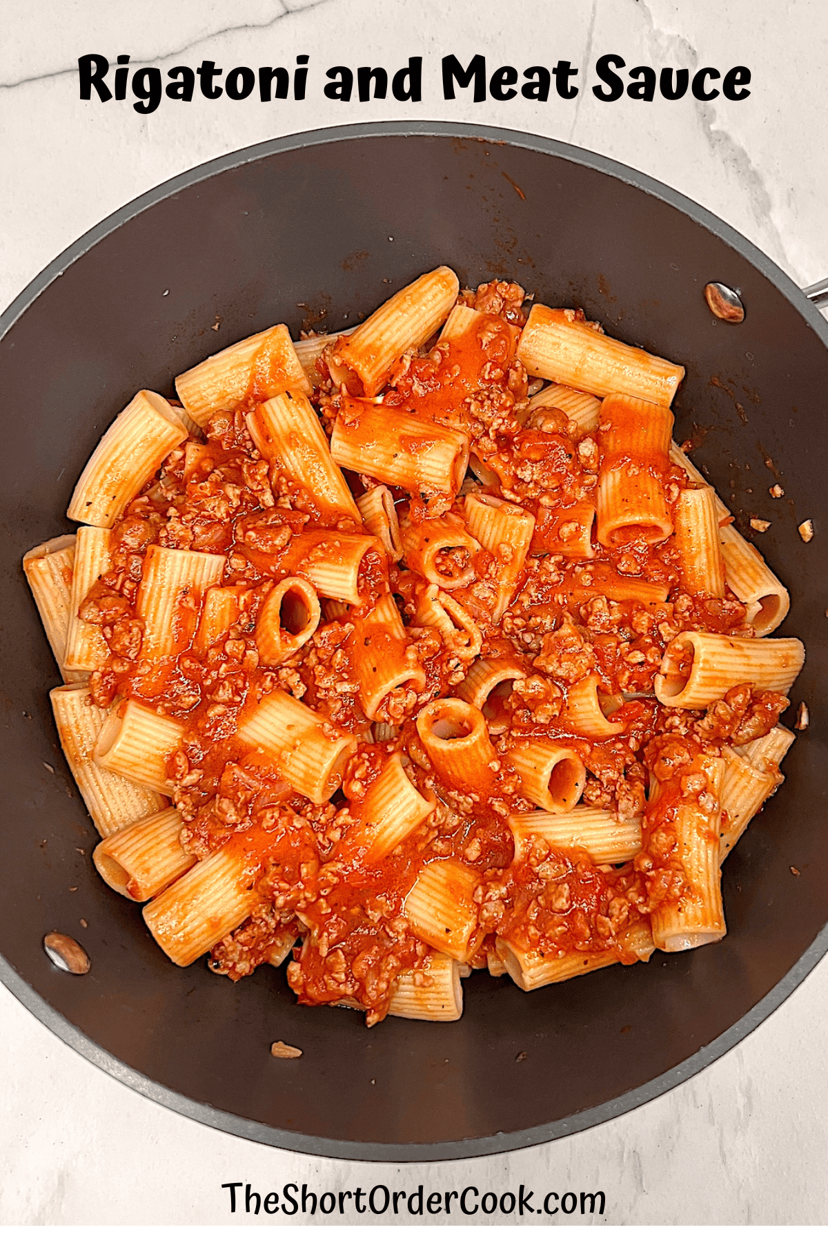 Rigatoni and Meat Sauce in a pasta pot ready to serve