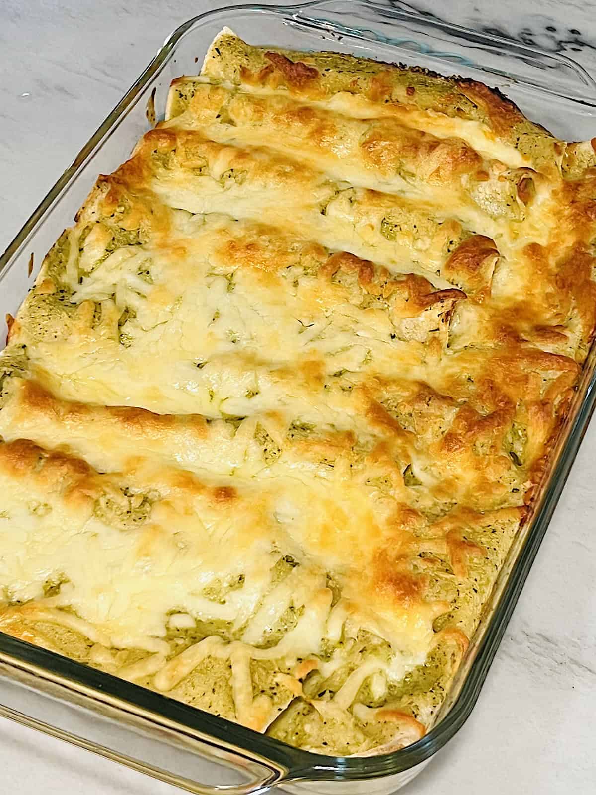 Enchiladas Suizas Extra crispy melted cheese on top.