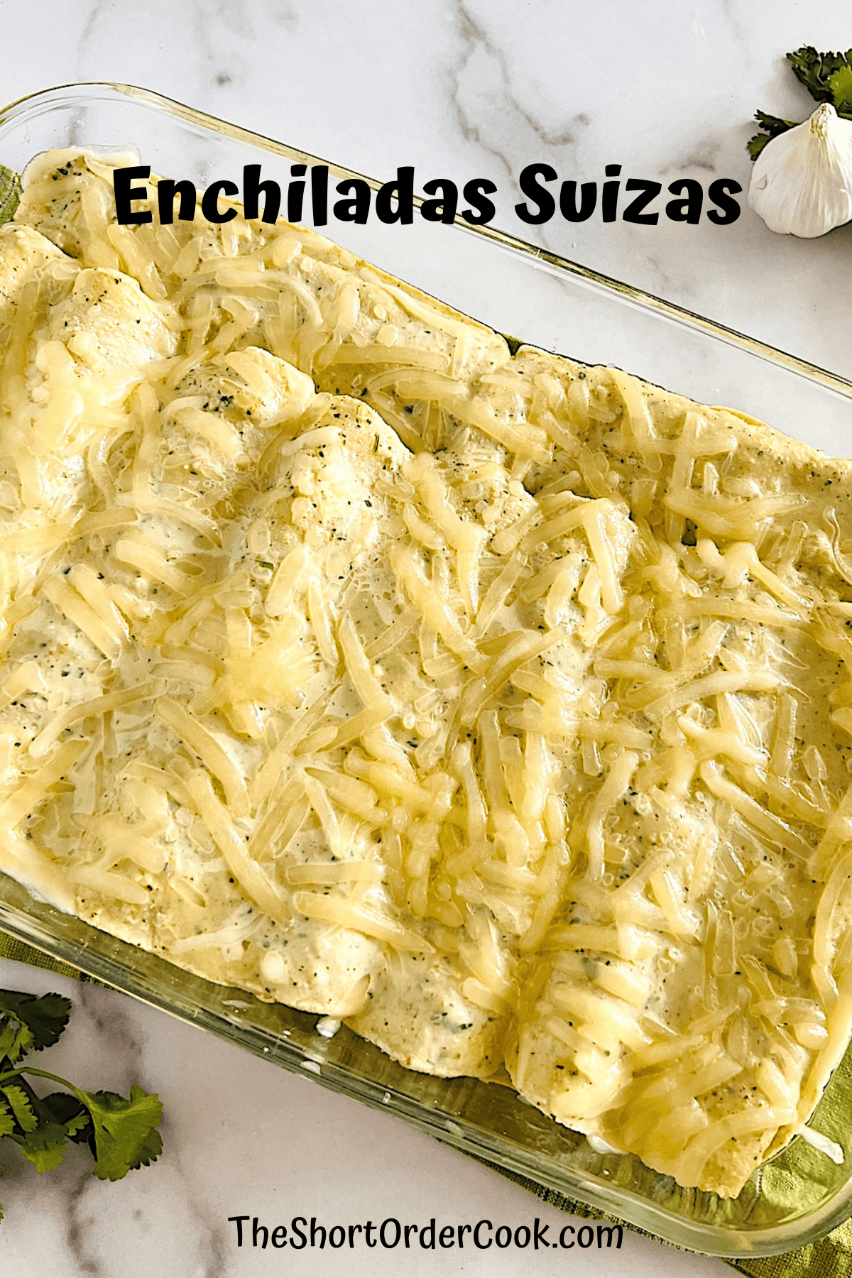 Enchiladas Suizas baked with melty cheese and filled with chicken.