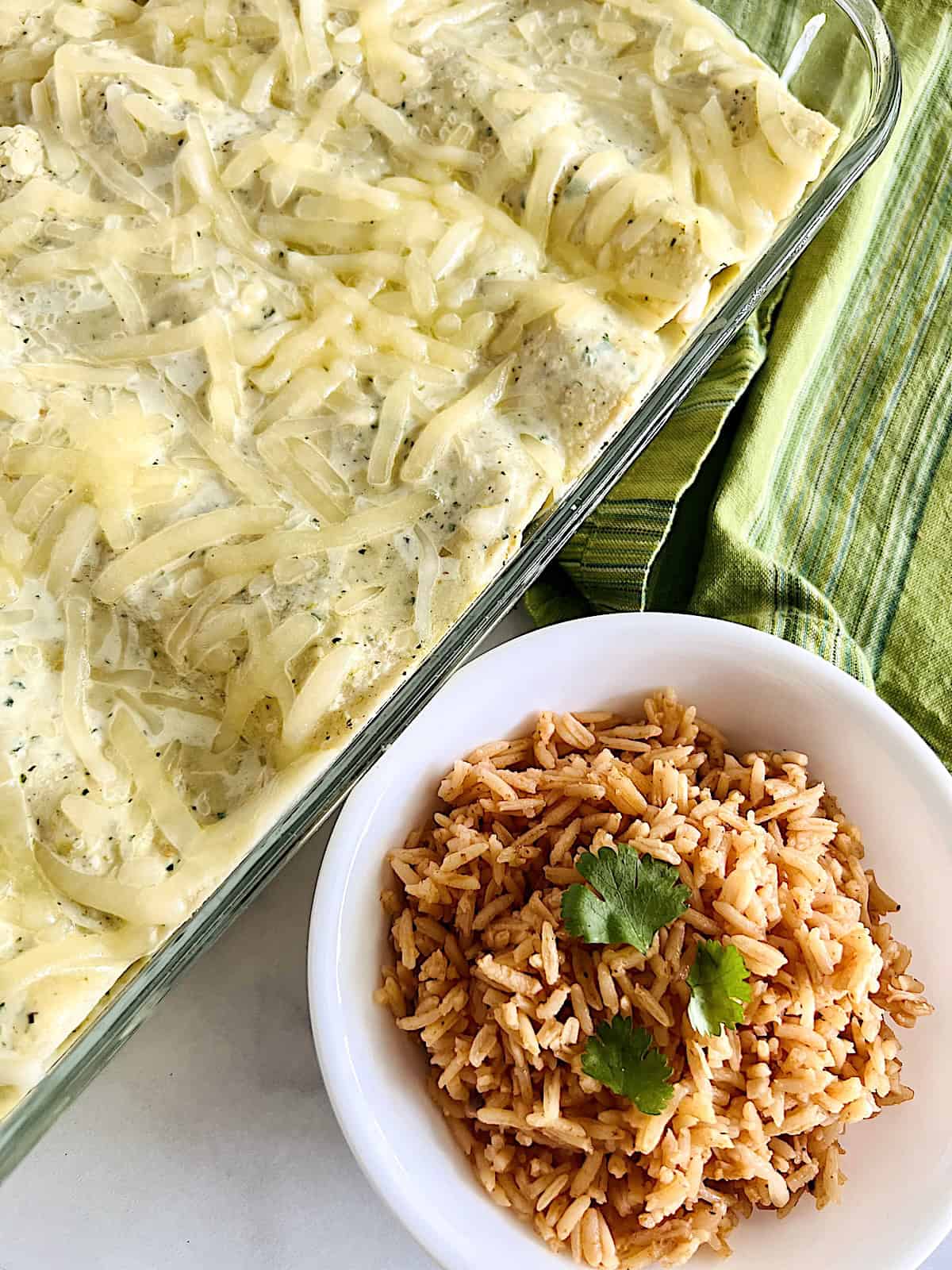 Enchiladas Suizas Served with Mexican Rice for dinner.