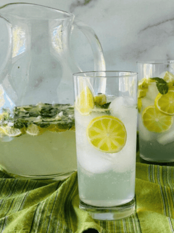 Mojitos by the Pitcher big batch recipe with limes, mint and Bacardi white rum