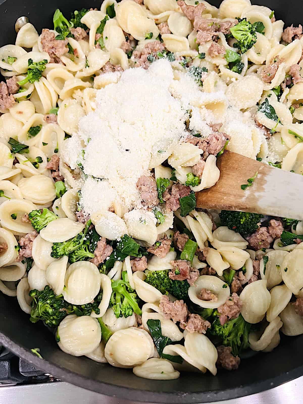 Orecchiette with Sausage and Broccoli Rabe Adding grated parmesan.