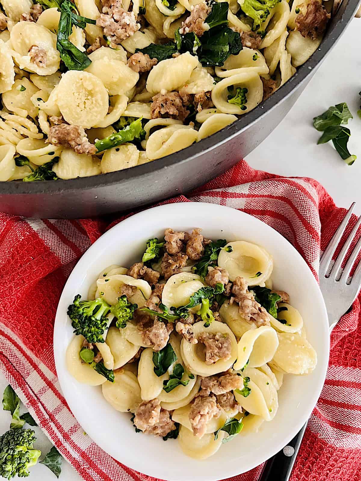Orecchiette with Sausage and Broccoli Rabe Best Italian recipe for pasta meal with crumbled sausage and greens.