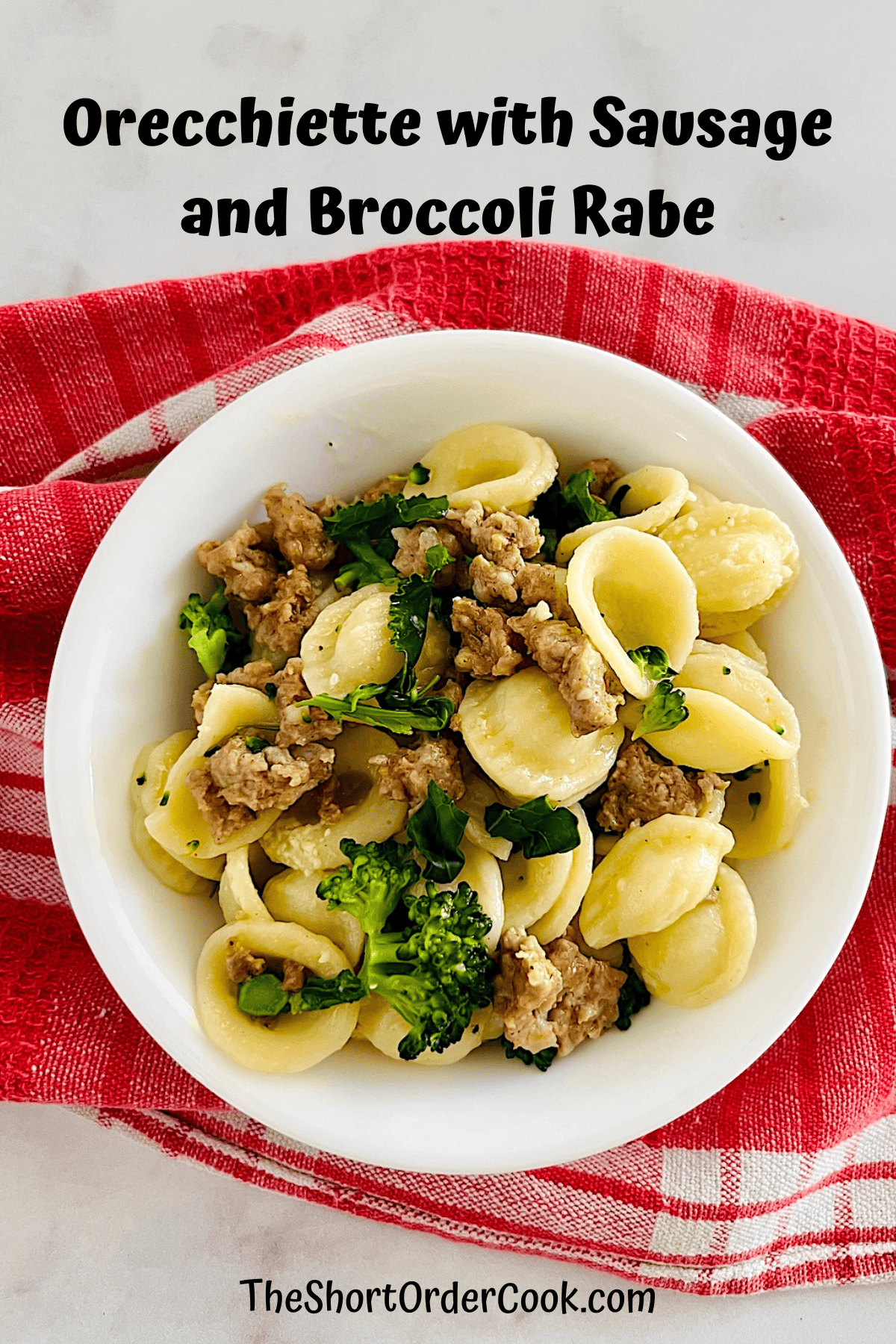 Orecchiette with Sausage and Broccoli Rabe in a bowl ready to eat.