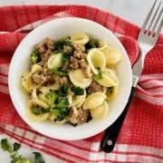 Italian recipe for classic Orecchiette with Sausage and Broccoli Rabe in a bowl.