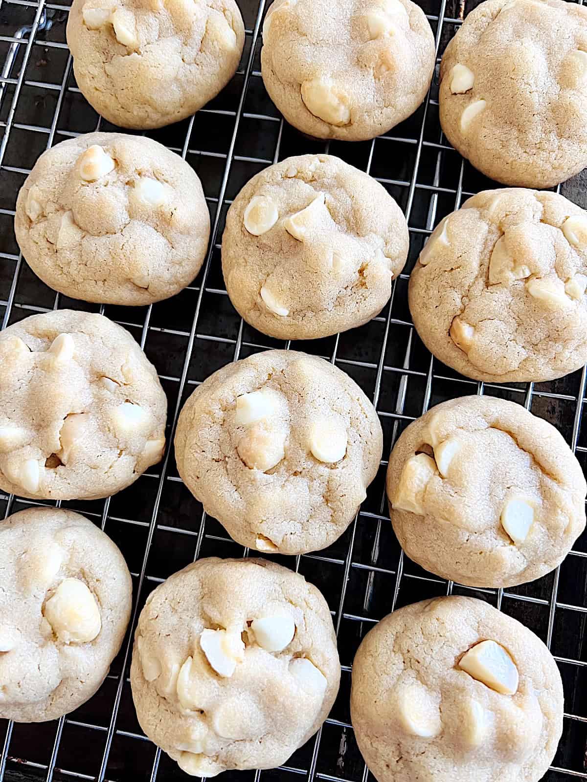 White Chocolate Macadamia Cookies Baked and cooling on wire rack.