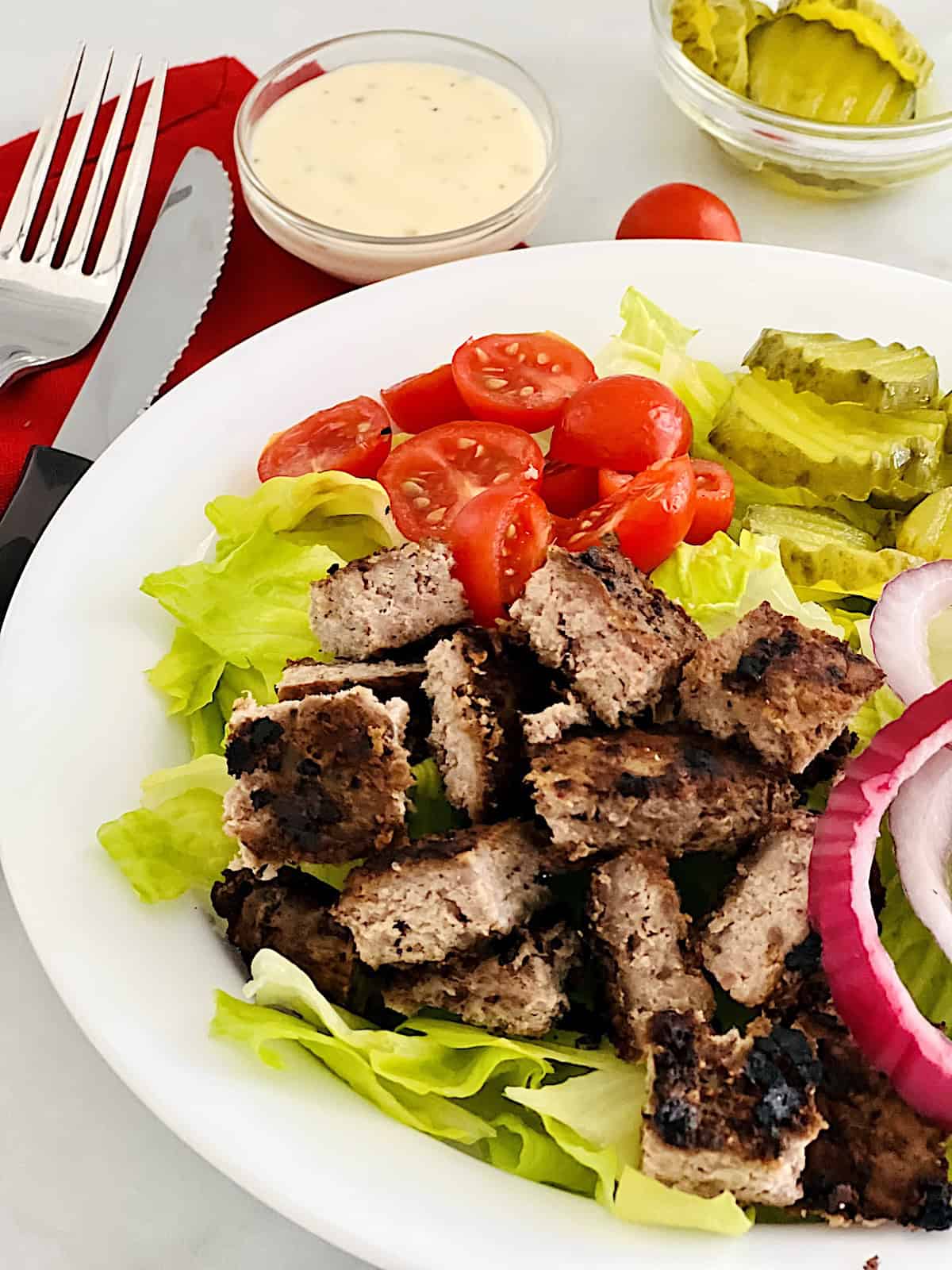 Healthy Burger Bowl Served with dressing.