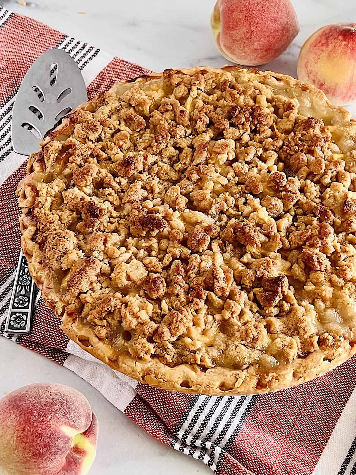 Peach Crumble Pie Best homemade recipe with fresh peaches and streusel topping.