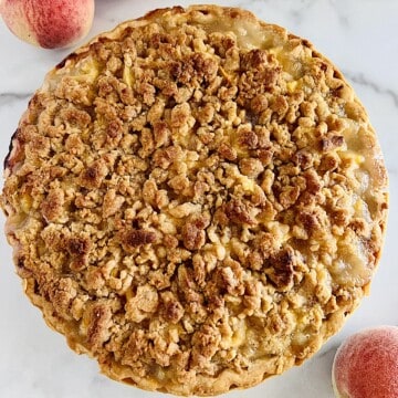 Peach Crumble Pie fresh baked unsliced.