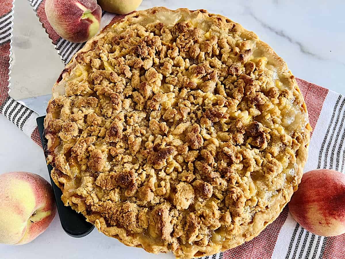 Peach Crumble Pie Best homemade recipe with diced summer peaches and brown sugar streusel topping