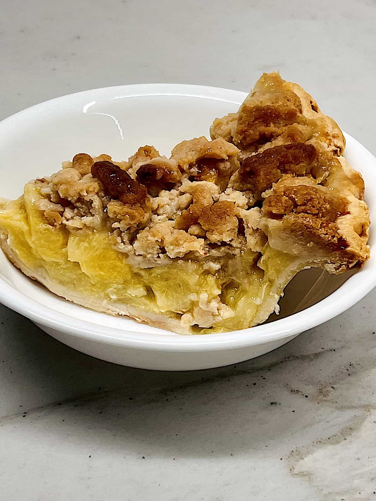 Peach Crumble Pie Slice in a bowl.