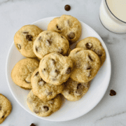 Plate of homemade chewy chocolate chip cookies made without brown sugar.