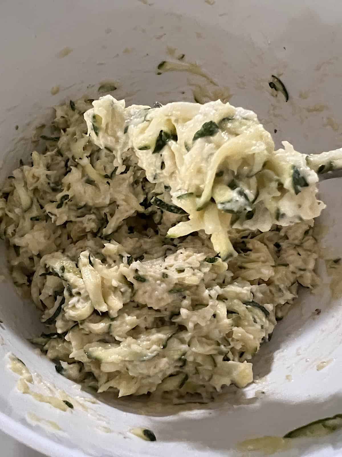 Zucchini Fritters Batter in bowl ready to fry.