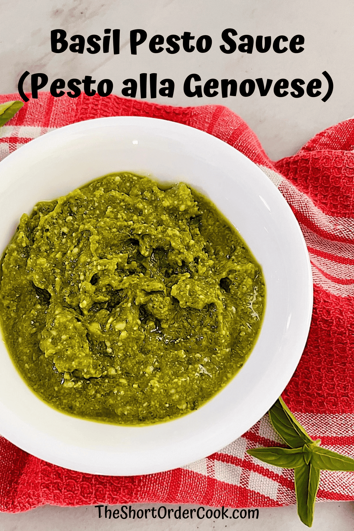 Basil Pesto Sauce (Pesto alla Genovese) in a bowl drizzled with olive oil.