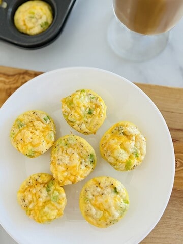 Mini Egg Bites with ham and cheese fresh baked and plated to eat.