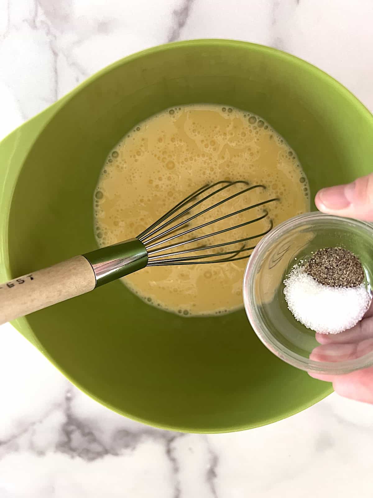 Whisking ingredients in a bowl.