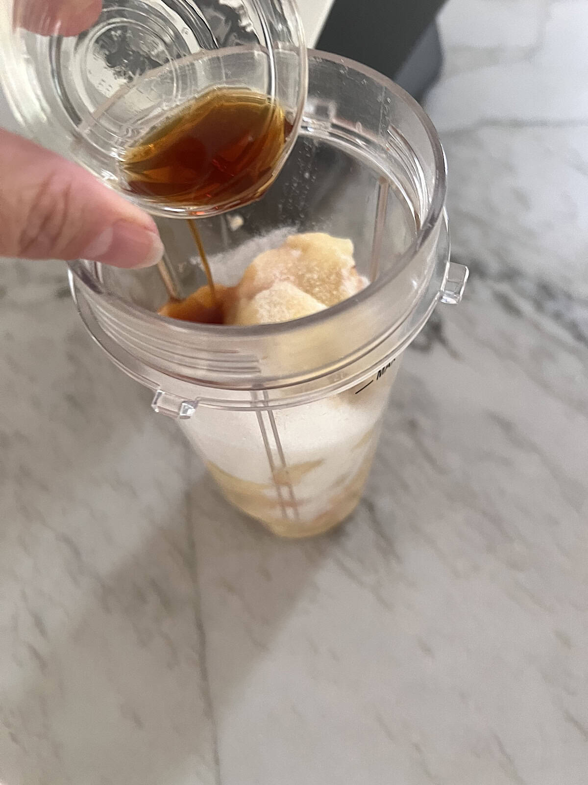 Adding ingredients to blender.