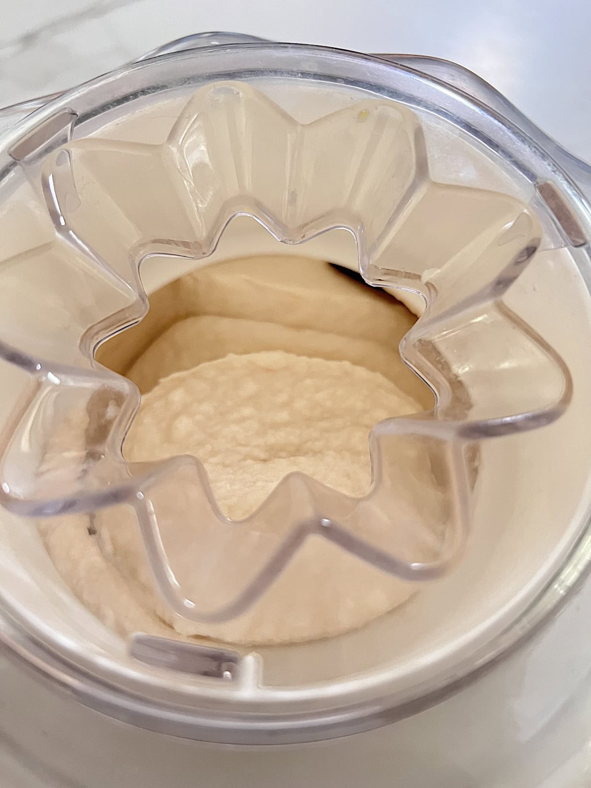 Churning peach mixture in cuisinart ice cream maker