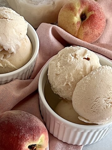 Peach Ice Cream with fresh summer fruit in a homemade recipe made in the Cuisinart.