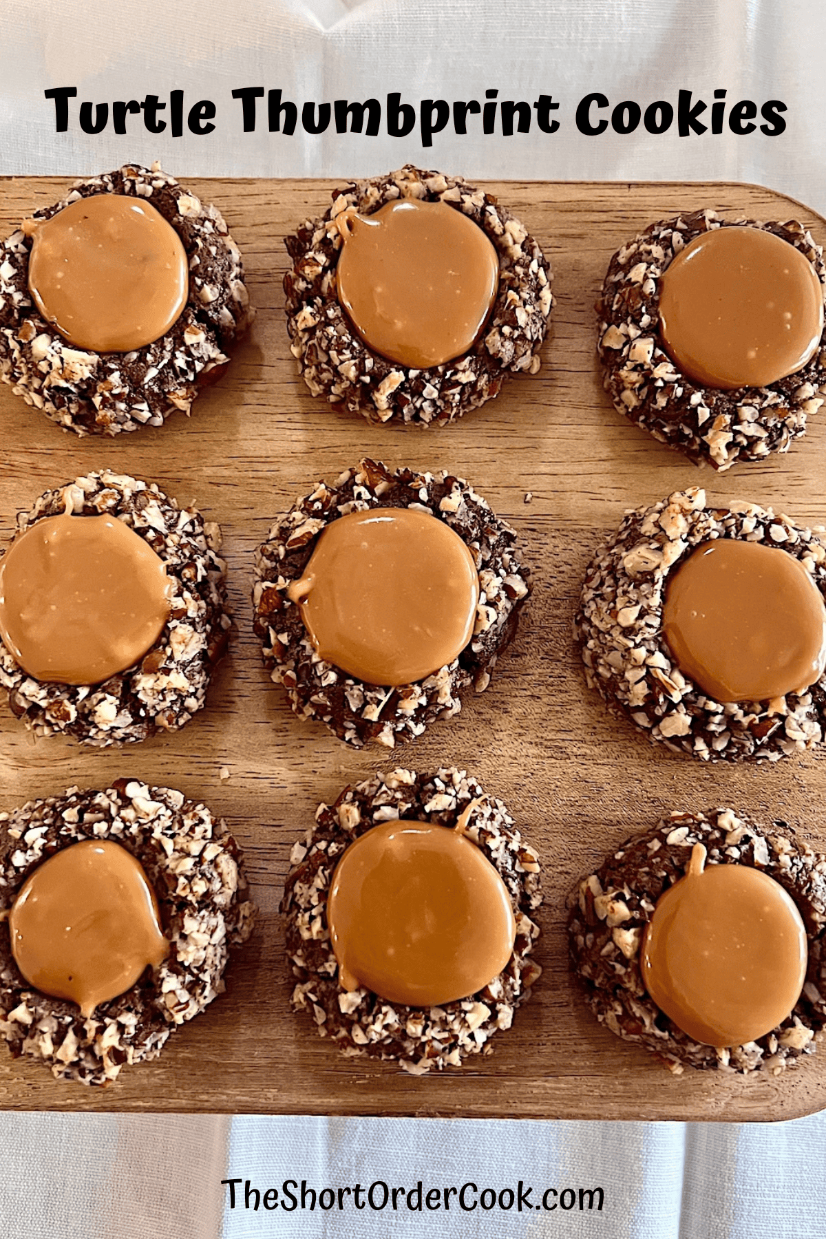 Turtle Thumbprint Cookies with nuts & caramel baked for Christmas dessert.