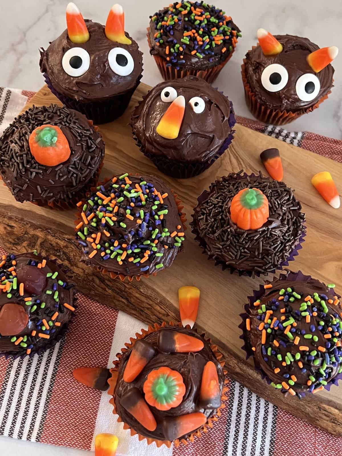 Halloween Cupcakes Best chocolate recipe with frosting and decorated with sprinkles and candy.